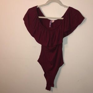 Red over the shoulder body suit